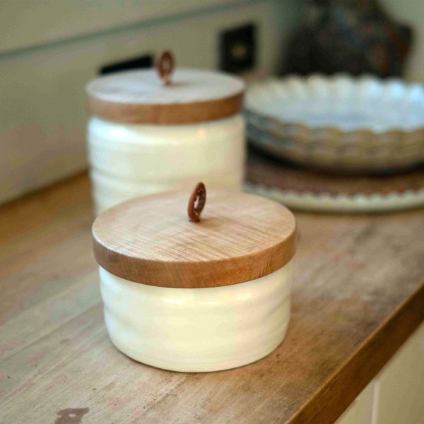 Porcelain vessels with maple wood lids